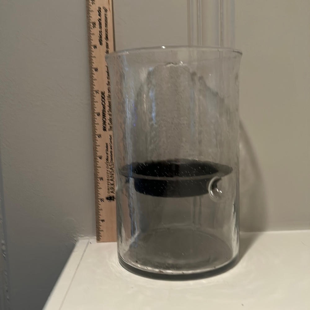 Candleholder with metal insert